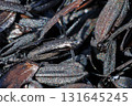 Burned and carbonized husks from newly threshed rice 131645245