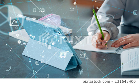 Girl studying while looking at tablet and communication network e-learning 131645406