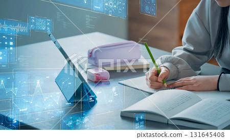 Girl studying while looking at tablet and digital technology 131645408