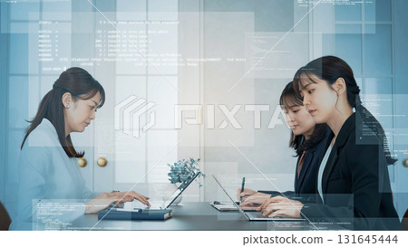 Group of women using laptops and programming image 131645444