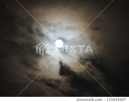 The moon hidden in the clouds 131645607