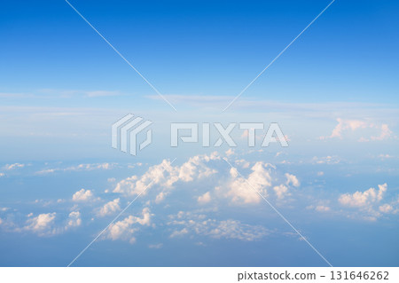 Overlooking the blue sky and white clouds above the clouds Overlooking the blue sky and white clouds above the clouds 131646262