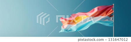 The flag of Luxembourg waving in the wind against a blue sky. 131647012