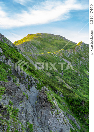 View of the morning glow of Mt. Kamikawachi from Mt. Minami in the Southern Alps. Climbing Mt. Hijiri in the Southern Alps 131647449