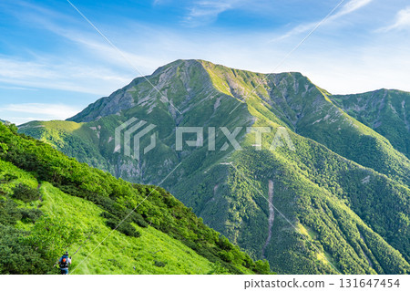 Mt. Hijiri (Mae Hijiri, Oku Hijiri) in the Southern Alps, seen from Mt. Minami in the Southern Alps. Hijiri climbing in the Southern Alps. Mt. Hijiri (Mae Hijiri, Oku Hijiri) in the Southern Alps, seen from Mt. Minami in the Southern Alps. Hijiri climbing in the Southern Alps. 131647454