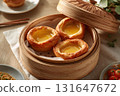 Golden Portuguese egg tarts in bamboo steamer at dim sum table 131647672