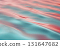 Smooth turquoise and coral ripples blend seamlessly across calming gradient surface 131647682