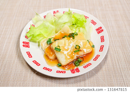 Grilled Daikon Radish Mochi with Thick Sauce Grilled Daikon Radish Mochi with Thick Sauce 131647815