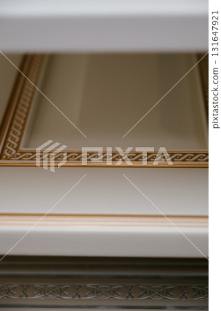 A stack of kitchen cabinet samples in different colors and textures 131647921