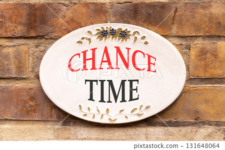 Chance time symbol. Concept word Chance time on beautiful white sign on brown old brick wall . Beautiful brown old brick wall background. Business chance time concept. Copy space. Chance time symbol. Concept word Chance time on beautiful white sign on brown old brick wall . Beautiful brown old brick wall background. Business chance time concept. Copy space. 131648064