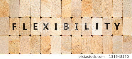 Flexibility symbol. Concept word Flexibility on beautiful wooden blocks. Beautiful wooden blocks background. Business flexibility concept. Copy space. Flexibility symbol. Concept word Flexibility on beautiful wooden blocks. Beautiful wooden blocks background. Business flexibility concept. Copy space. 131648150