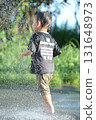 A boy playing water 131648973