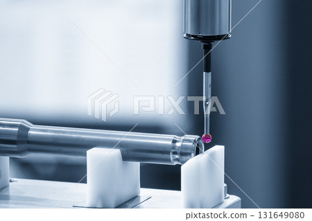 The CMM machine measuring the automotive parts in the blue tone. The CMM machine measuring the automotive parts in the blue tone. 131649080
