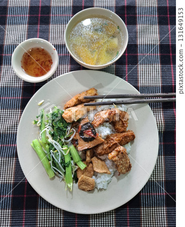 Vietnamese vegetarian rice meal with soy meat Vietnamese vegetarian rice meal with soy meat 131649153
