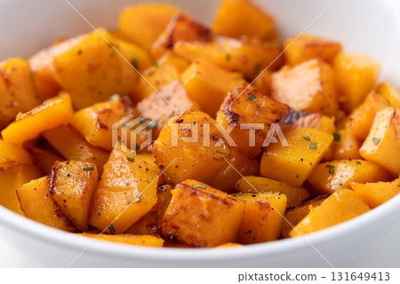 Roasted butternut squash pumpkin in a bowl, Autumn homemade food 131649413