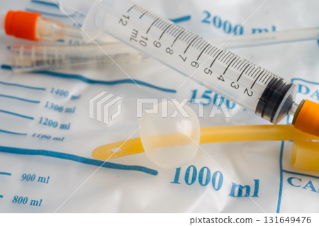 Foley catheter and urine drainage bag collect urine for disability or patient in hospital. 131649476