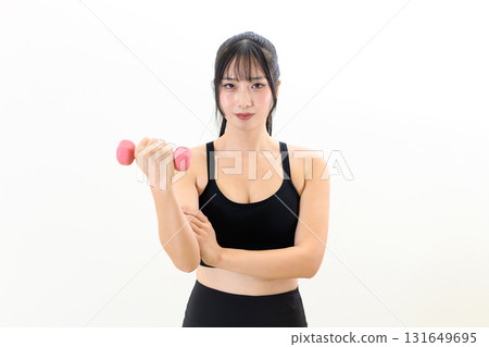 Cool woman working out, woman holding dumbbells, front view, muscle training girl, white background Cool woman working out, woman holding dumbbells, front view, muscle training girl, white background 131649695