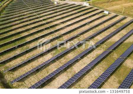 Aerial view of solar power plant. Electric panels for producing clean ecologic energy. 131649758