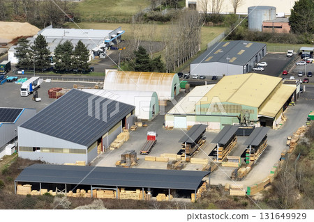 Aerial view of goods warehouses and logistics center in industrial city zone from above Aerial view of goods warehouses and logistics center in industrial city zone from above 131649929