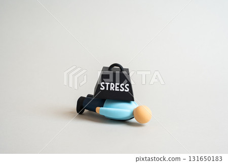 An office worker under stress. Exhaustion from workloads and emotional burnout. Concept of mental health, corporate pressure, fatigue, and productivity loss in modern office life. An office worker under stress. Exhaustion from workloads and emotional burnout. Concept of mental health, corporate pressure, fatigue, and productivity loss in modern office life. 131650183