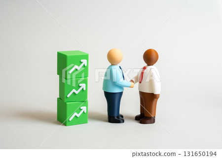 Businessmen enter into a deal that promises profit. Concept of partnership, negotiation, financial success, and investment opportunities. Symbol of trust, ambition, and strategic cooperation. 131650194