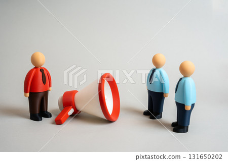A businessman uses a megaphone to persuade other employees. Attracting investors and clients. Concept of leadership, influence, motivation, and corporate communication strategy. 131650202