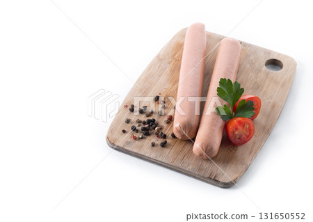 Raw Frankfurt sausages with cherry tomatoes and parsley Raw Frankfurt sausages with cherry tomatoes and parsley 131650552