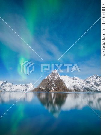 Aurora Borealis in Scandinavia. Norway, Lofoten islands. Northern lights over the mountains. 131651019