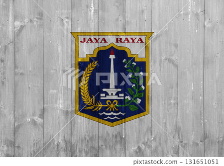 The official flag of Jakarta, the capital of Indonesia, on a wooden texture. Conceptual collage 131651051