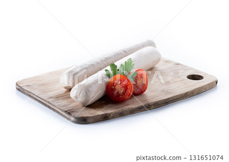 Raw Bratwurst sausages with cherry tomatoes and parsley Raw Bratwurst sausages with cherry tomatoes and parsley 131651074