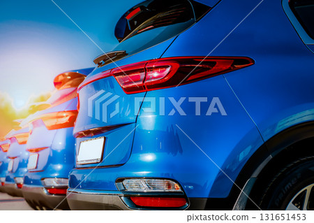 Blue Family business spotrs hatchback Car on sunset. Business success concept Blue Family business spotrs hatchback Car on sunset. Business success concept 131651453