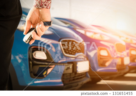 Blue business car with shiny front lights color bright 131651455