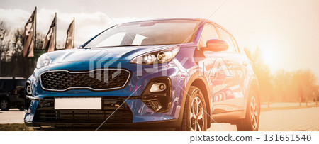 Blue Family business spotrs hatchback Car on sunset. Business success concept Blue Family business spotrs hatchback Car on sunset. Business success concept 131651540