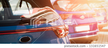 Blue business car with shiny front lights color bright 131651547