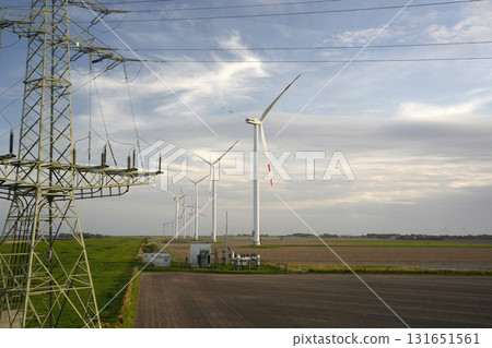 Wind tower turbine power plant at sunset Wind tower turbine power plant at sunset 131651561