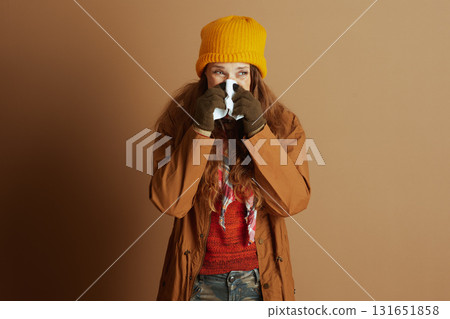 Woman with Cold Symptoms in Autumn Outfit Woman with Cold Symptoms in Autumn Outfit 131651858