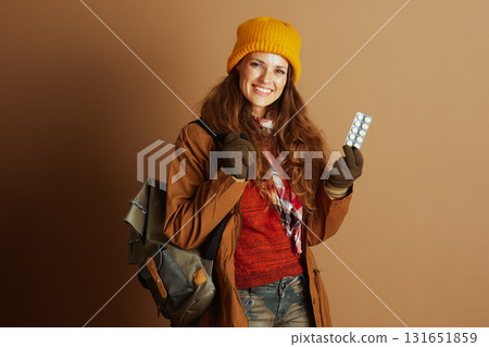 Smiling Traveler with Medication and Backpack Smiling Traveler with Medication and Backpack 131651859