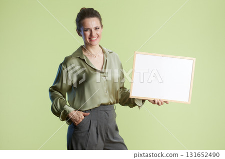 Friendly professional holding blank sign 131652490