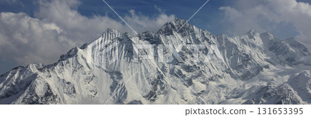 Snow covered mountain Ponggen Dopchu seen from Tserko Ri. Scene in the Langtang Valley, Nepal. 131653395