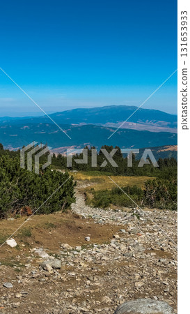 Mountain view of the Rila Mountains in Bulgaria. Seven Rila Lake hike. Eco trails. Connection with nature. Mountain view of the Rila Mountains in Bulgaria. Seven Rila Lake hike. Eco trails. Connection with nature. 131653933