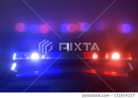Police car flashing red and blue lights at night 131654157
