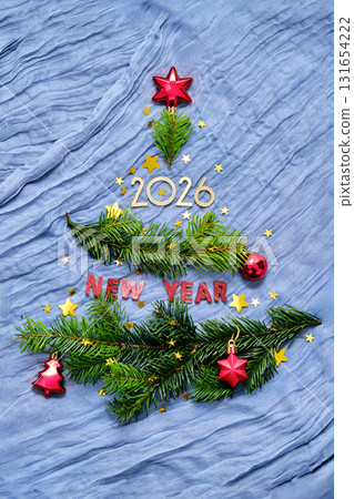 New Year background with branches in the shape of a Christmas tree. New Year background with branches in the shape of a Christmas tree. 131654222