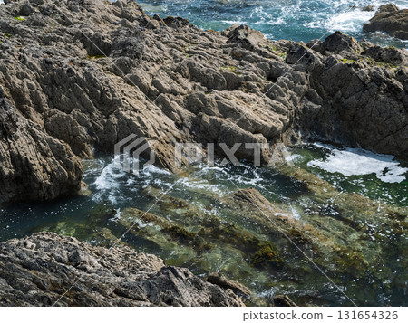 The landscape of West Cork, Ireland, is beautiful. It has a rocky coastline and clear waters. The landscape of West Cork, Ireland, is beautiful. It has a rocky coastline and clear waters. 131654326