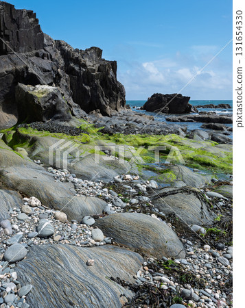 Beautiful coastal scenery with a mix of rock and sea. Beautiful coastal scenery with a mix of rock and sea. 131654330