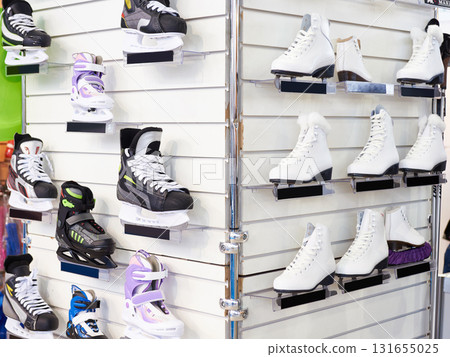 Ice hockey and figure skates in shop 131655025