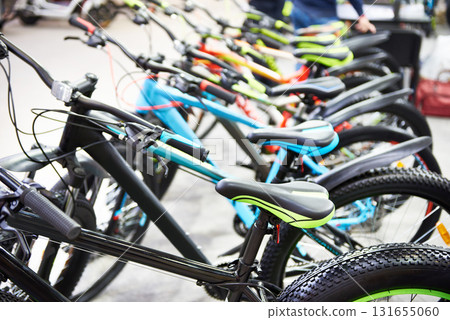 Modern mountain bikes in sports shop Modern mountain bikes in sports shop 131655060