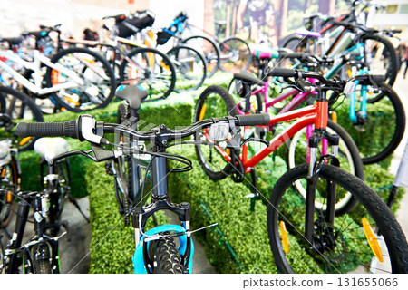 Modern mountain bikes in sports shop Modern mountain bikes in sports shop 131655066