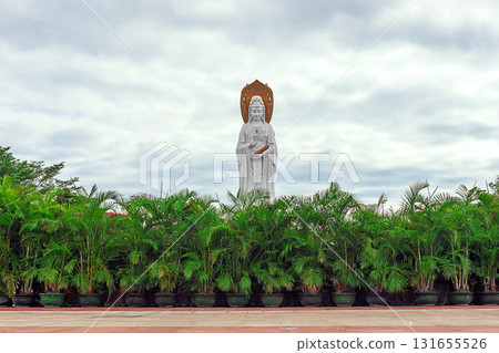The Guanyin statue on Hainan Island, China. A majestic Buddhist monument by the sea The Guanyin statue on Hainan Island, China. A majestic Buddhist monument by the sea 131655526