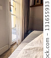 Cozy Morning Light in hotel room with balcony 131655933