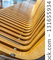 Wooden Bench Detail with Modern Curved Design 131655934